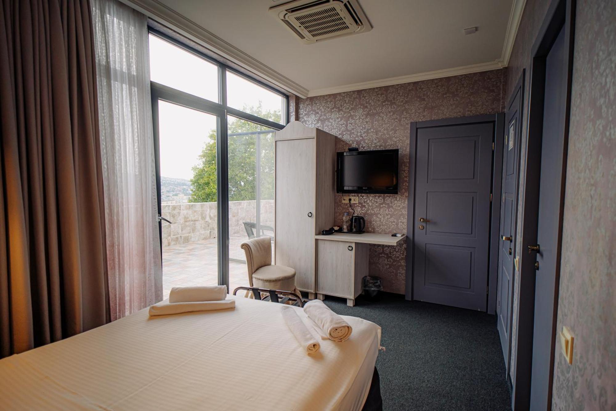 Hotel Day Inn Тбилиси Экстерьер фото
